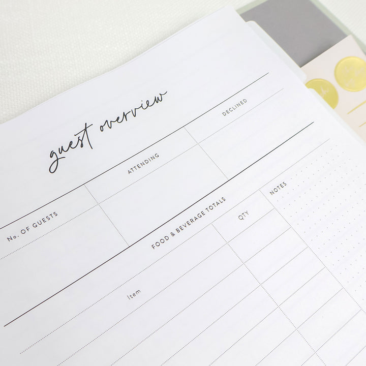 Our linen wedding planning binders include our comprehensive wedding planner full of handy worksheets like a guest list overview