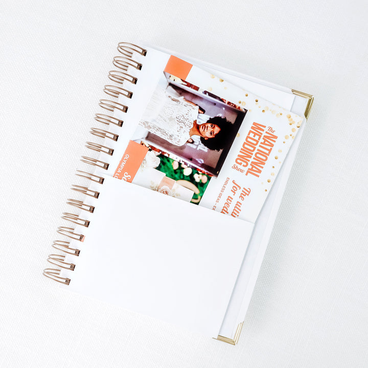 A handy double-sided pocket is included at the back of our planners for storing swatches and receipts. 