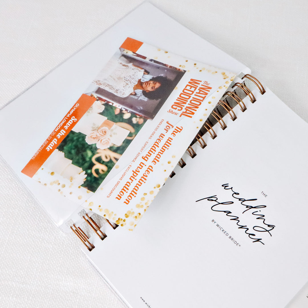 The glossy vinyl cover of our soft cover planners can also be used as an interior pocket.