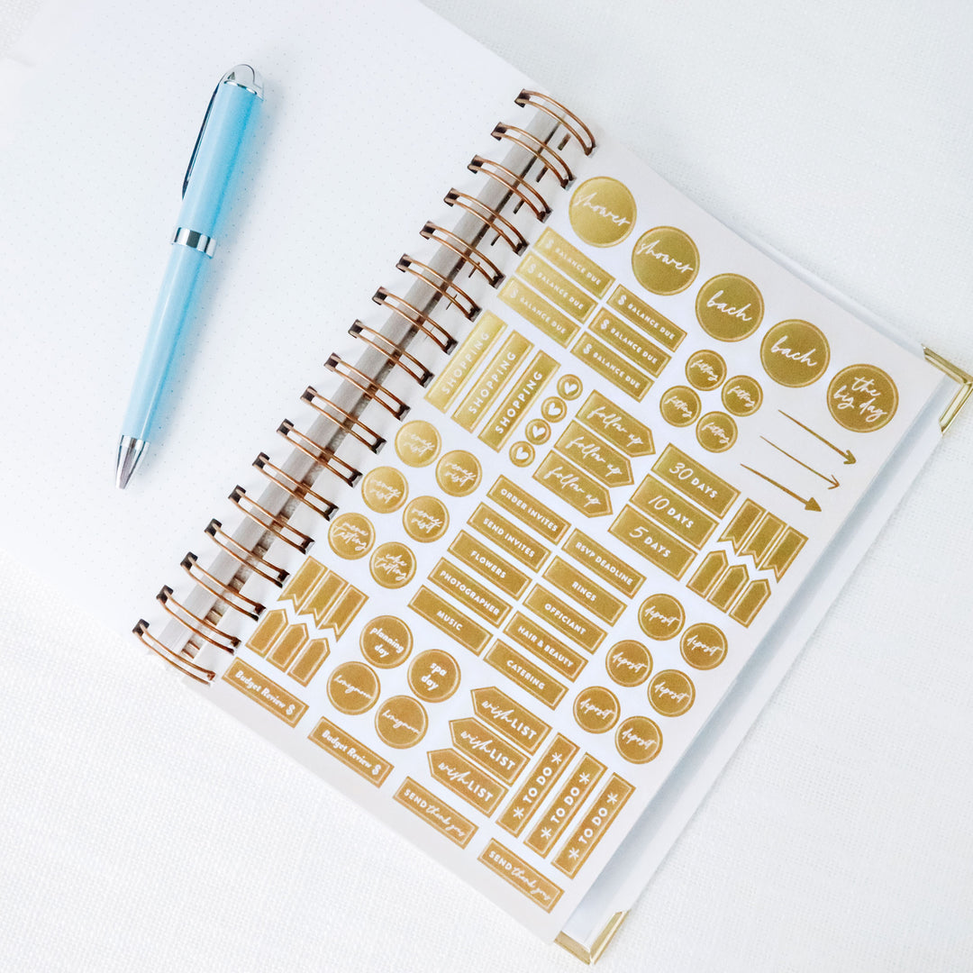 Each planner includes a sheet of custom gold foil wedding planning stickers that fit perfectly in our calendar boxes.