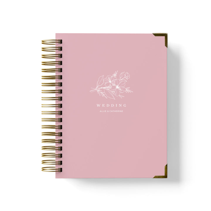 Our LGBT wedding planner books are all-inclusive and gender-neutral, shown in a delicate floral sprig design