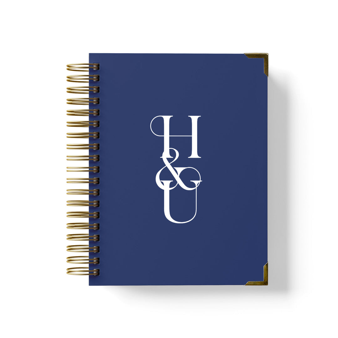 Our LGBT wedding planner books are all-inclusive and gender-neutral, shown in a bold monogram design