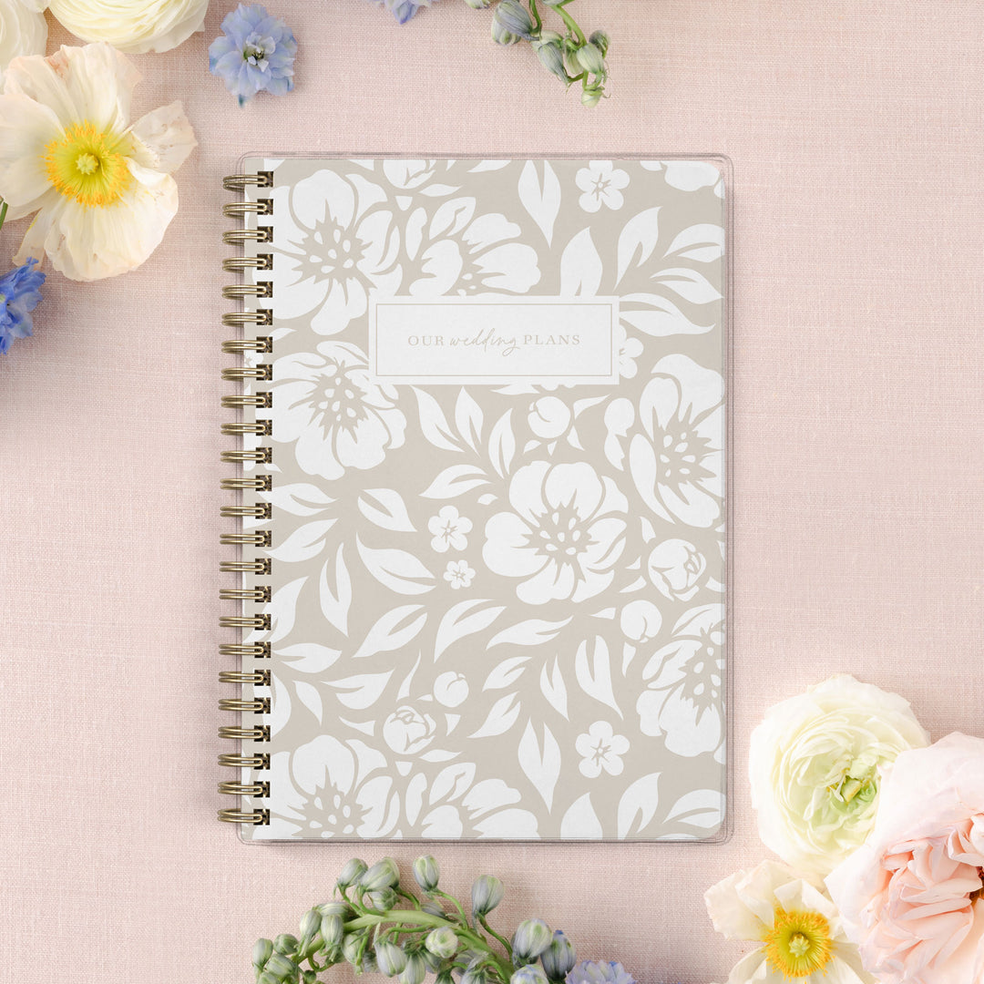 Our exclusive mini wedding planners are perfect for planning small weddings and elopements, shown in a neutral floral design