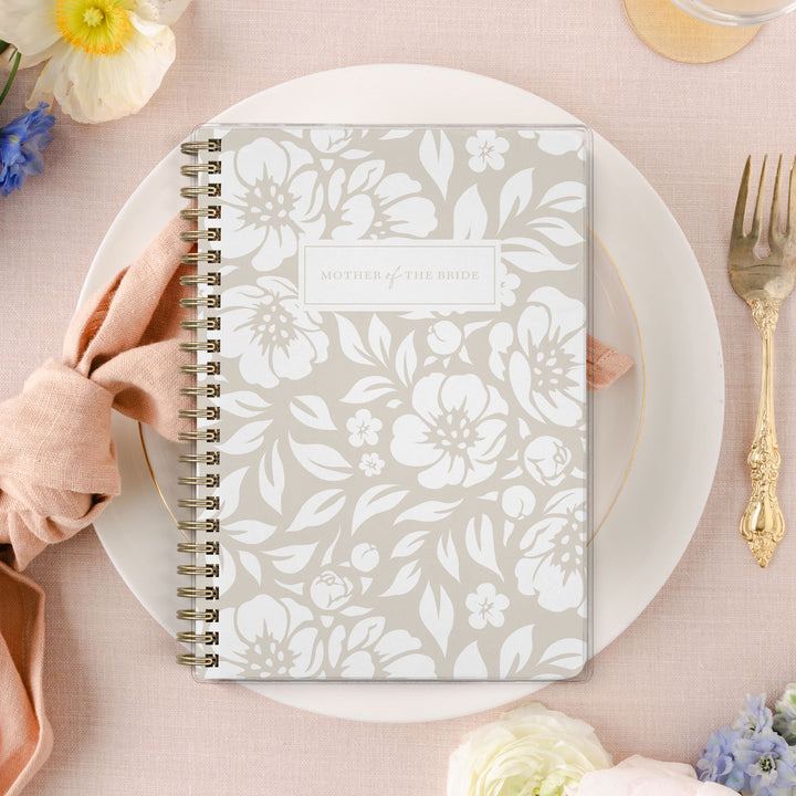 Shown in a neutral floral print, Mother of the Bride planners are exclusive to Wicked Bride.