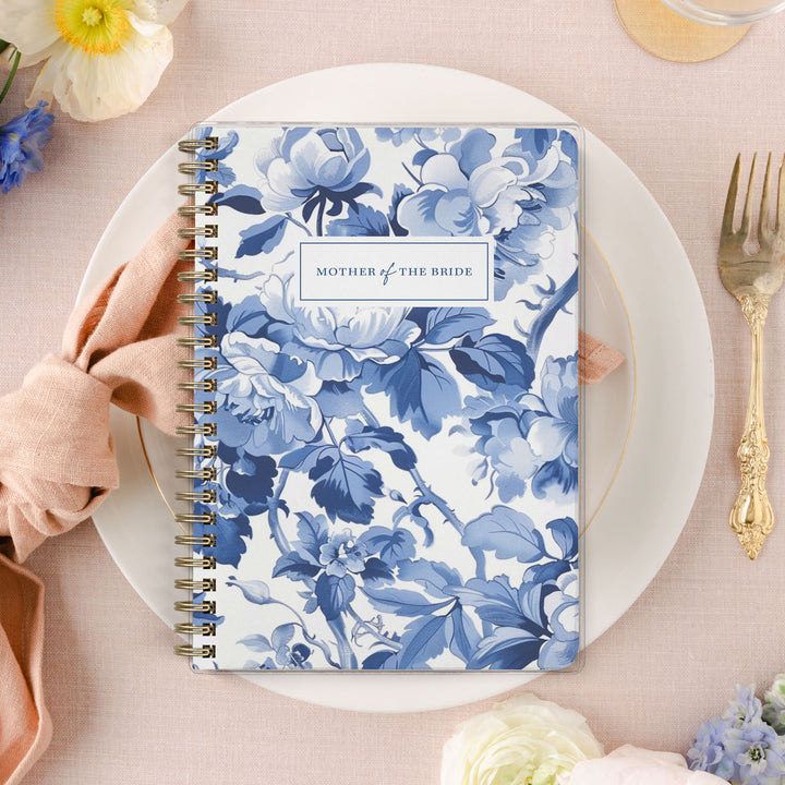 Shown in a blue toile print, Mother of the Bride planners are exclusive to Wicked Bride.