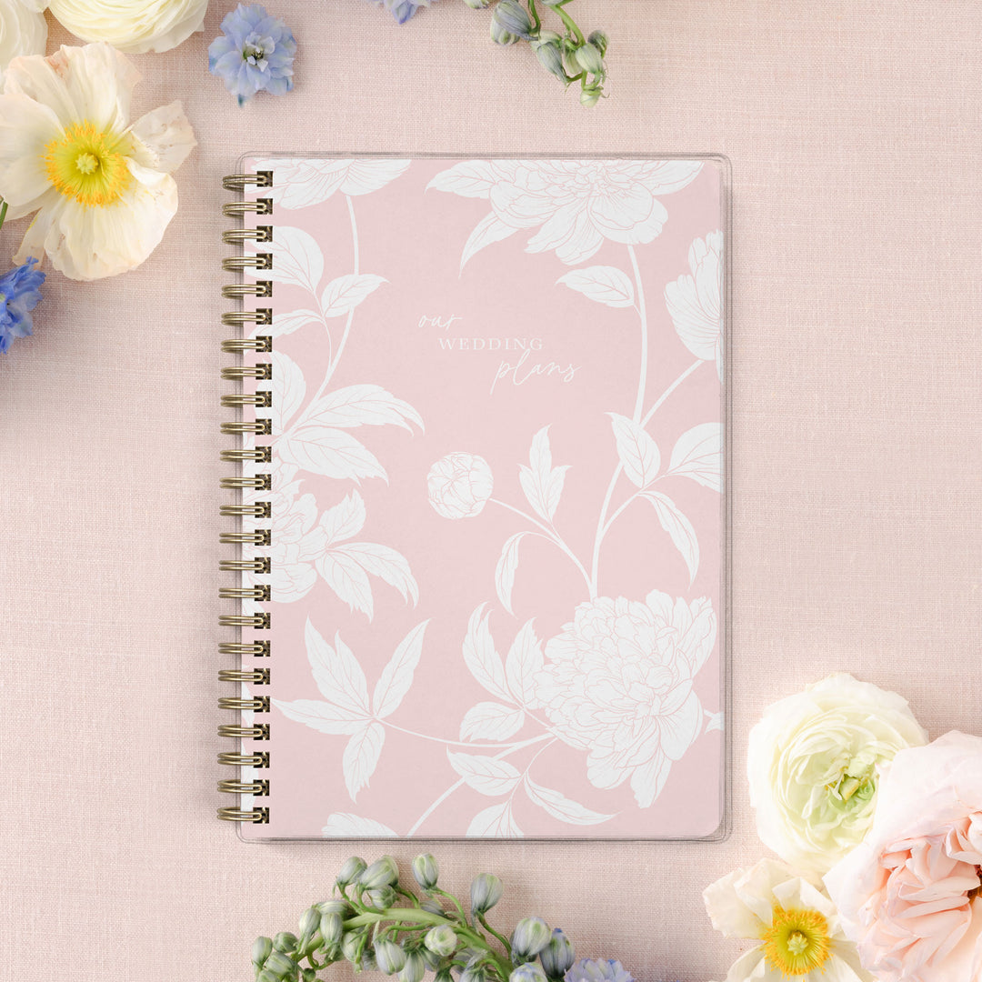 Our exclusive mini wedding planners are perfect for planning small weddings and elopements, shown in a blush peony pattern