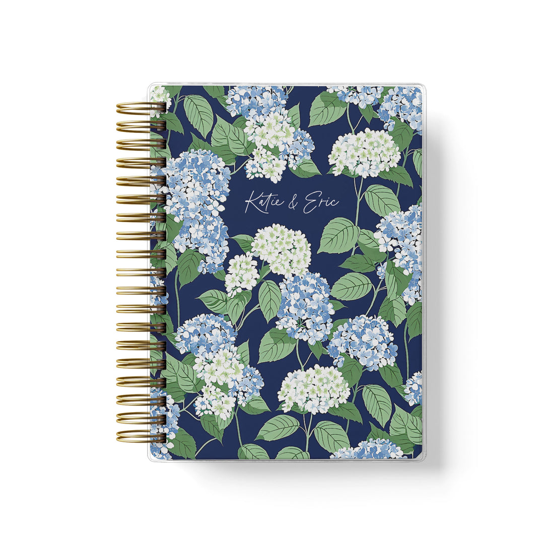 Our soft cover wedding planners are  the best option for brides on a budget, shown in a preppy blue and white hydrangea design perfect for a Cape wedding.