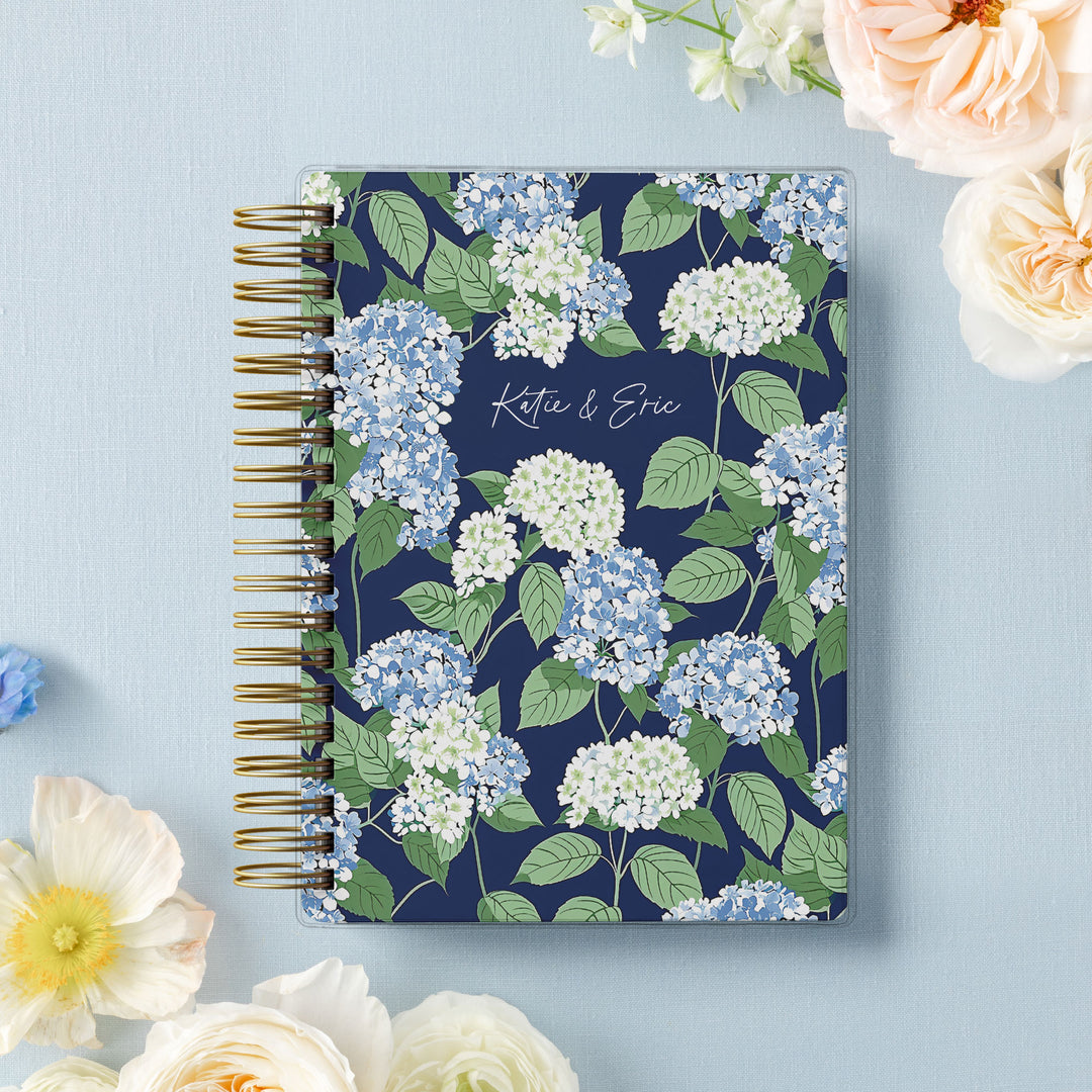 Our soft cover wedding planners are  the best option for brides on a budget, shown in a preppy blue and white hydrangea design perfect for a Cape wedding.