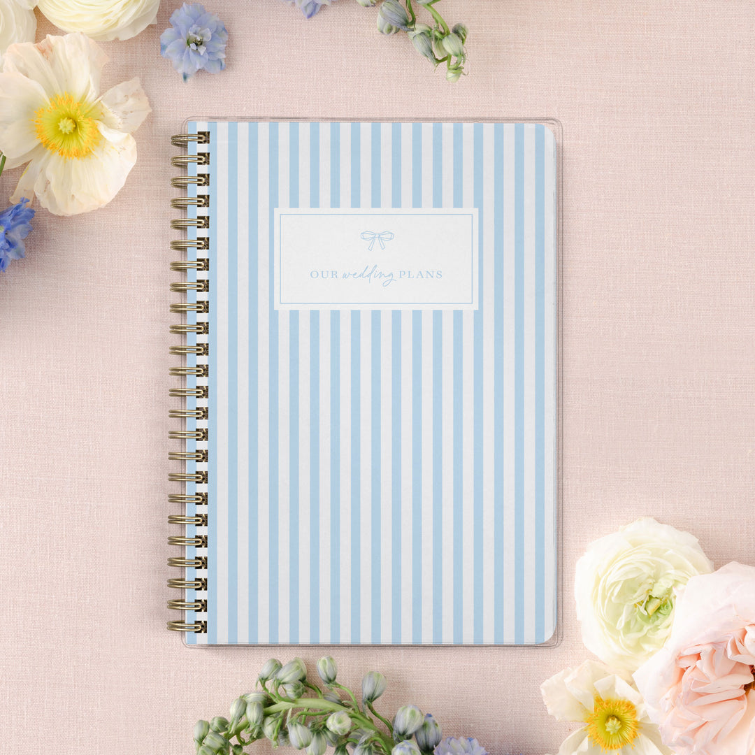 Our exclusive mini wedding planners are perfect for planning small weddings and elopements, shown in a classic blue and white stripe design