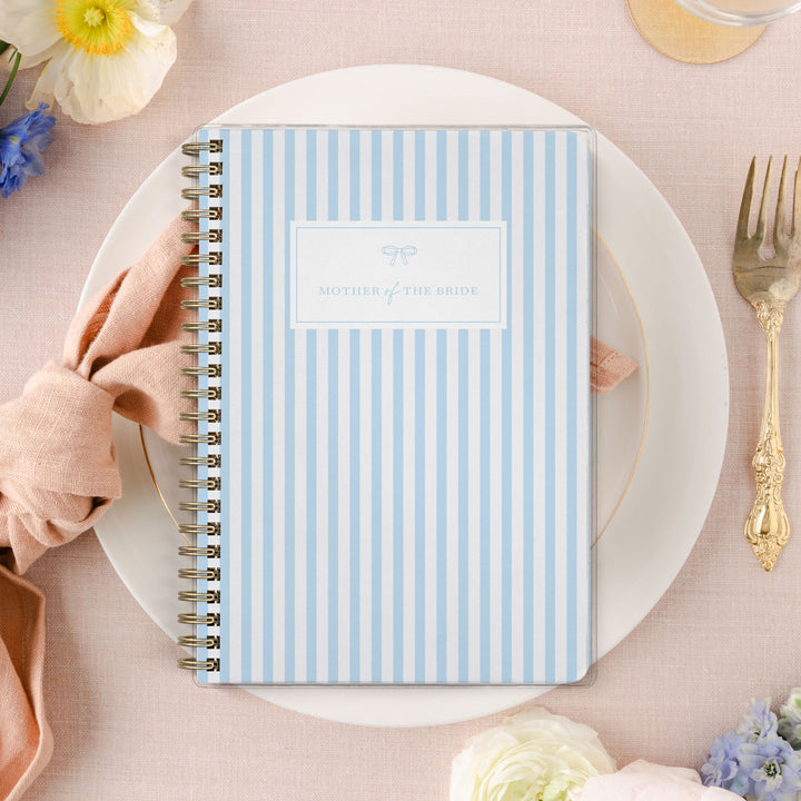 Shown in a classic blue and white stripe design, Mother of the Bride planners are exclusive to Wicked Bride.