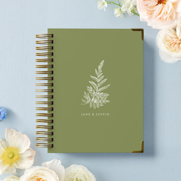 Our luxury wedding planner books are the best a bride can buy, featured in a botanical fern design