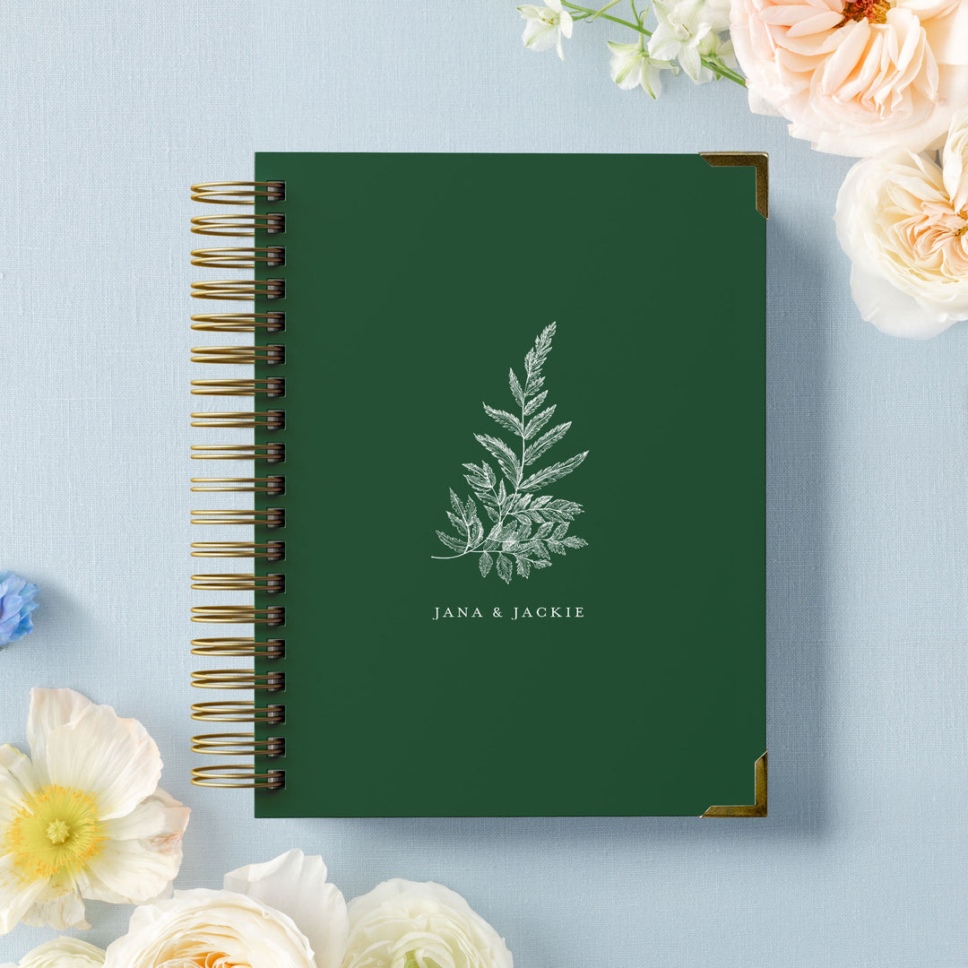 Our LGBT wedding planner books are all-inclusive and gender-neutral, shown in a botanical fern design