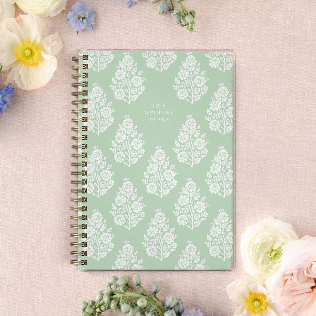 Our exclusive mini wedding planners are perfect for planning small weddings and elopements, shown in a green floral block print