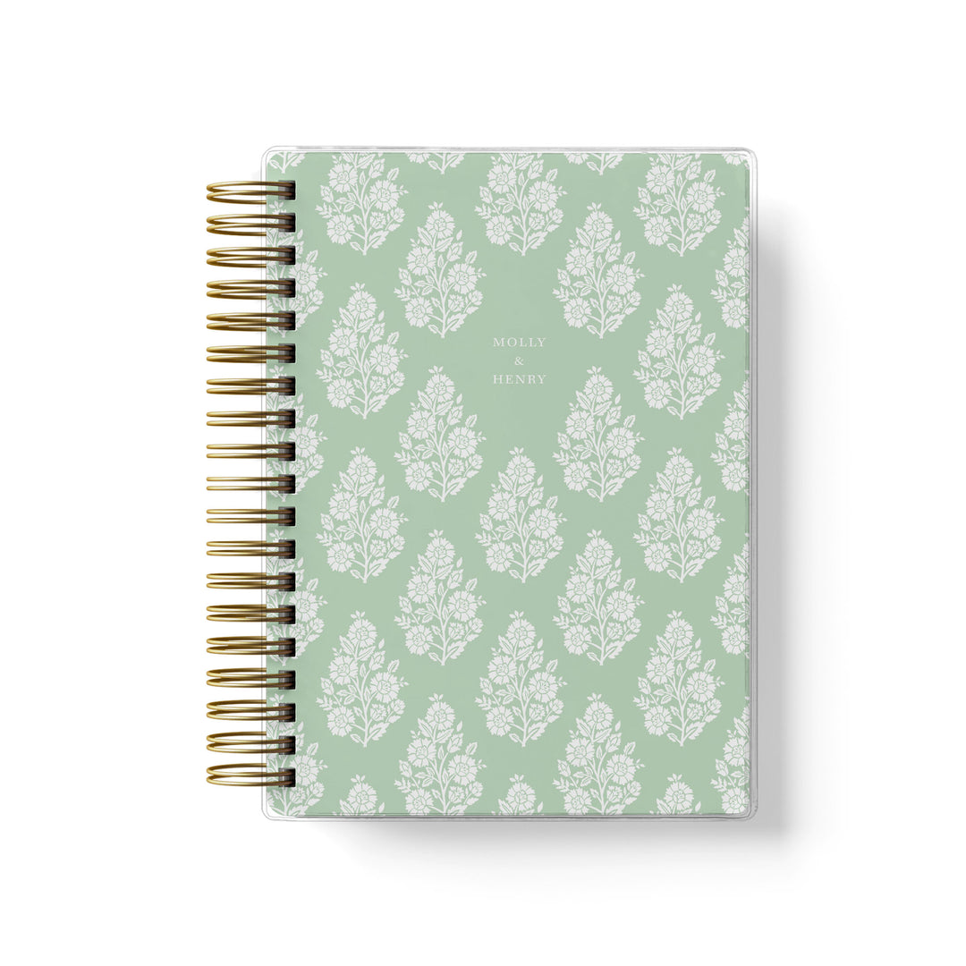 Our soft cover wedding planner books are the best option for a bride on a budget, featured in a floral block print design