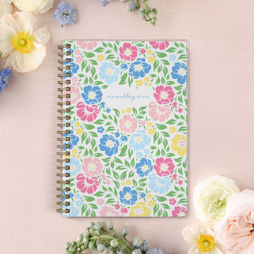 Our exclusive mini wedding planners are perfect for planning small weddings and elopements, shown in a colorful garden floral design.