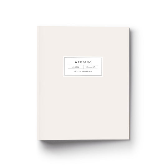 Our wedding binders are the perfect planning tool, shown in a modern apothecary label design