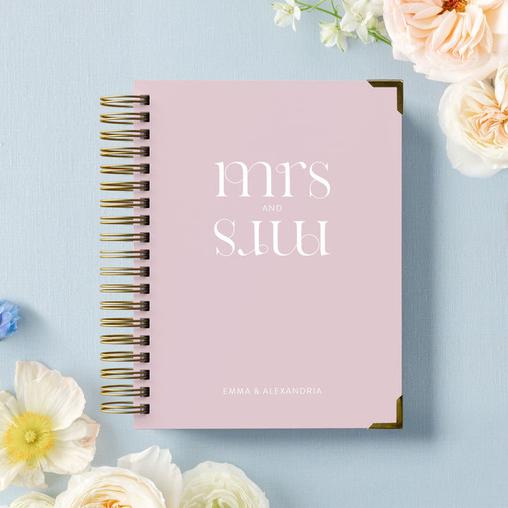 Our LGBT wedding planner books are all-inclusive and gender-neutral, shown in a future mrs and mrs design