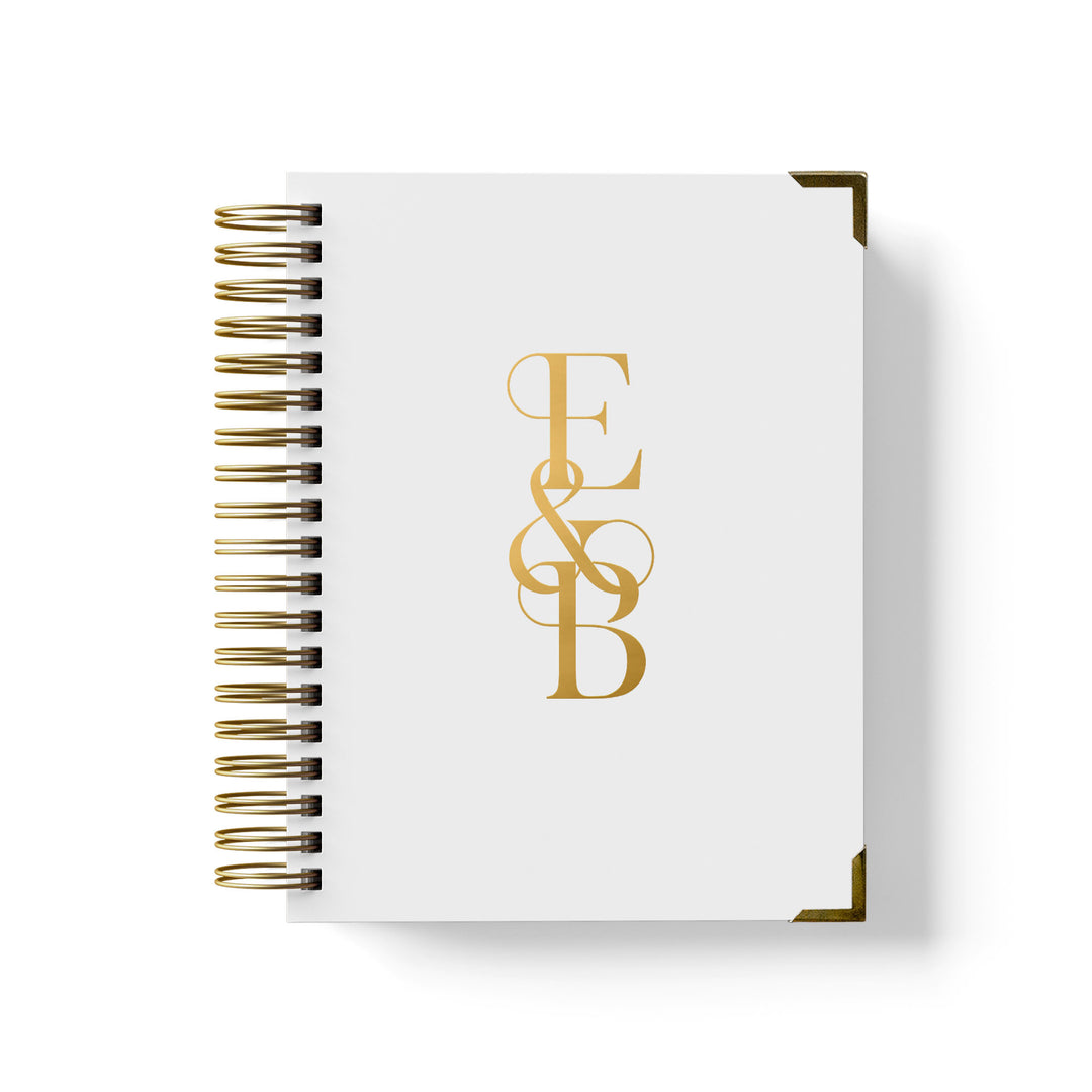 Our luxury wedding planner books are the best a bride can buy, featured in a bold monogram design