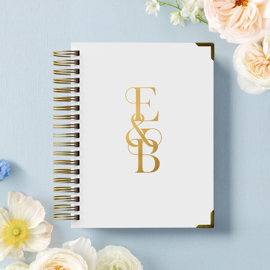 Our luxury wedding planner books are the best a bride can buy, featured in a bold monogram design