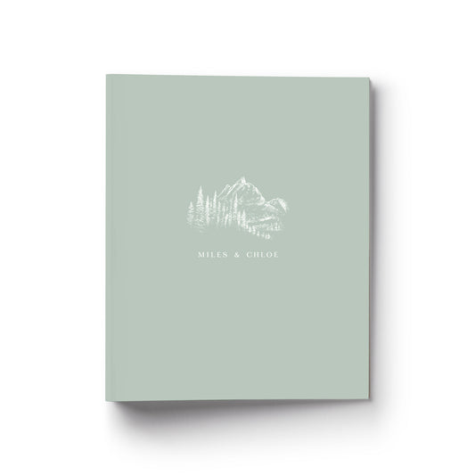 Our wedding binders are the perfect planning tool, design shows a mountain vista with trees