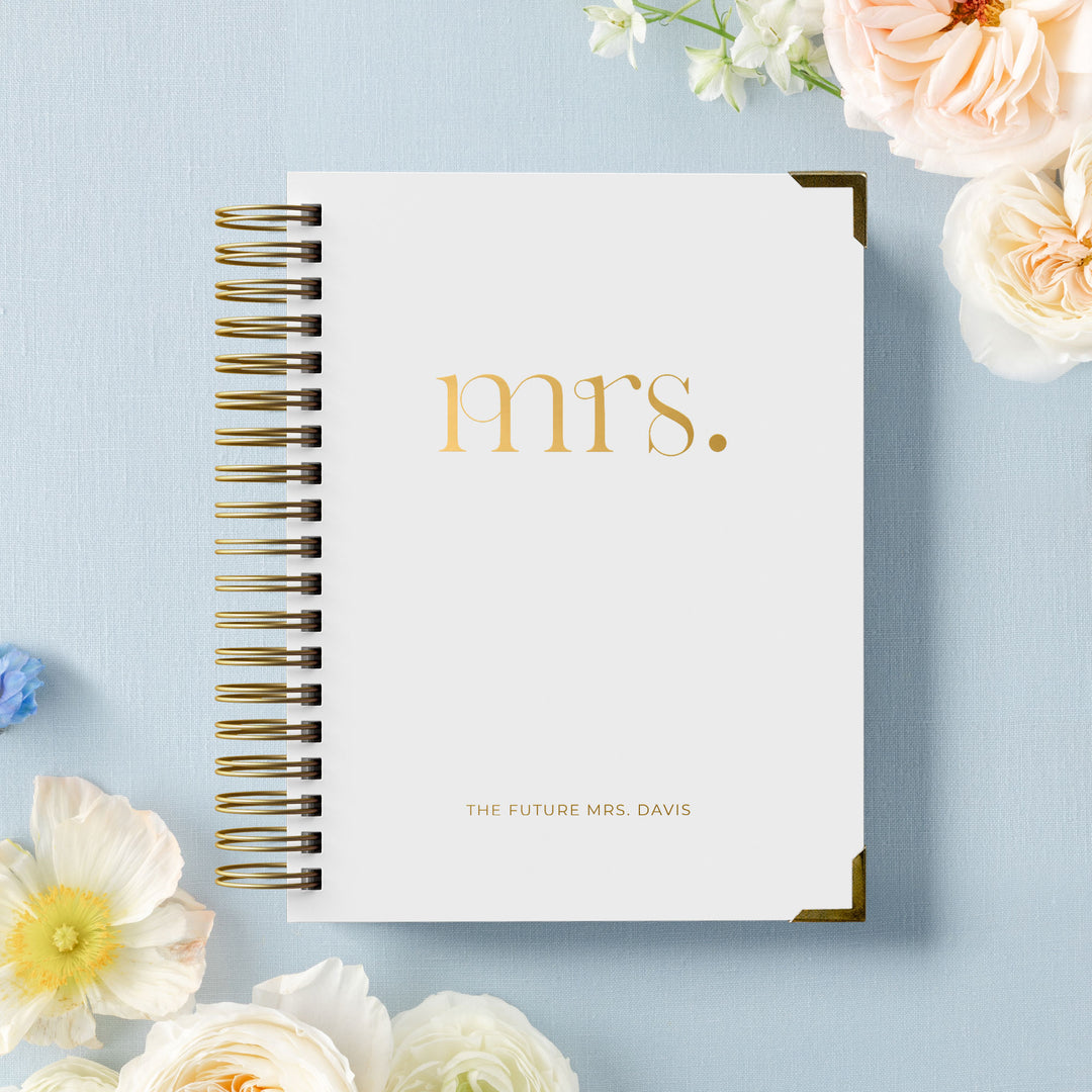 Our luxury wedding planner books are the best a bride can buy, featured in a bold foil mrs design