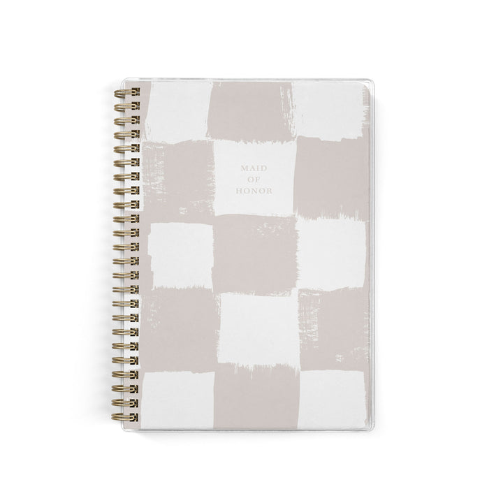 Our exclusive maid of honor planners are the perfect gift for your best friend, shown in a neutral painted checkerboard pattern