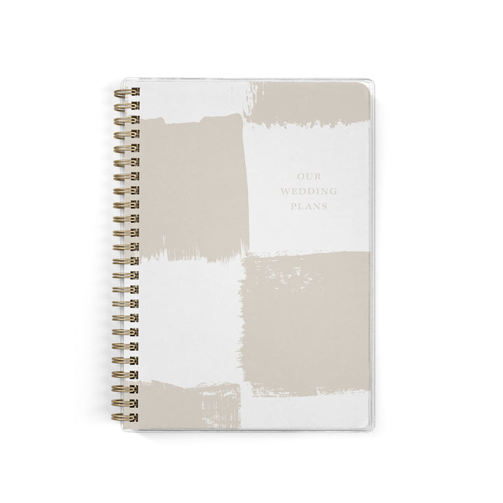 Our exclusive mini wedding planners are perfect for planning small weddings and elopements, shown in a neutral painted checkerboard pattern