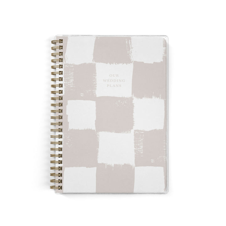 Our exclusive mini wedding planners are perfect for planning small weddings and elopements, shown in a neutral painted checkerboard pattern