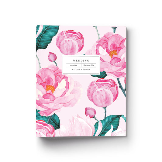 Our wedding binders are the perfect planning tool, shown in a preppy pink peony pattern