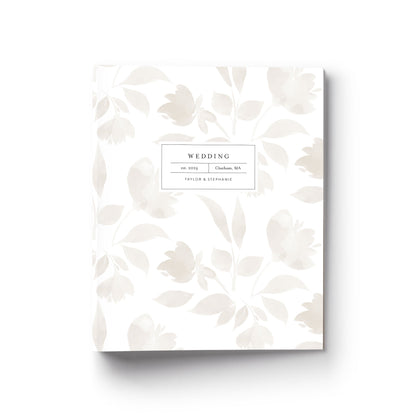 Our wedding binders are the perfect planning tool, shown in a watercolor floral design