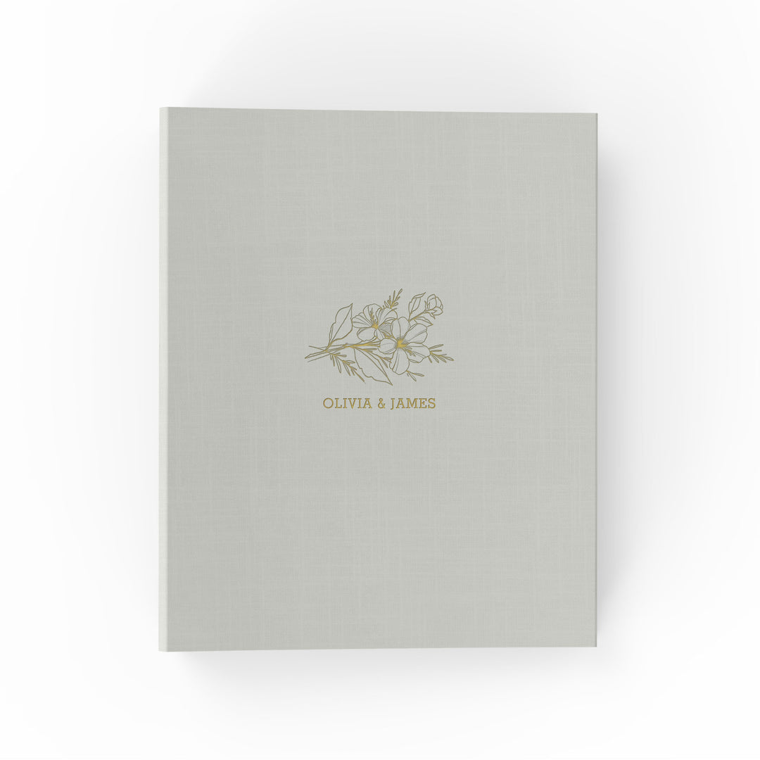 Our wedding binders are the perfect wedding planning tool, shown in a floral sprig design with the couple's first names