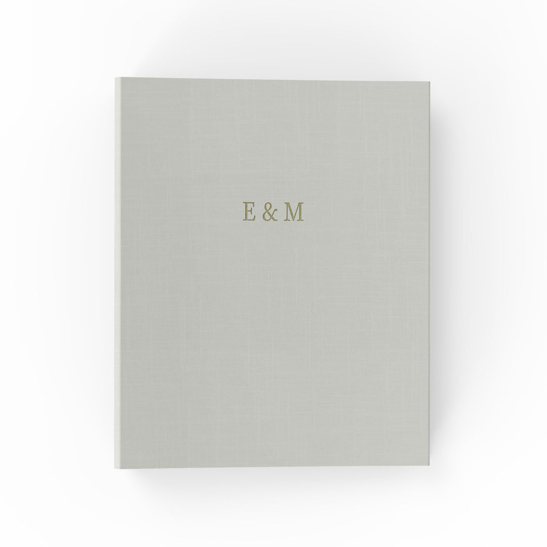 Our wedding binders are the perfect wedding planning tool, shown in a bold monogram design