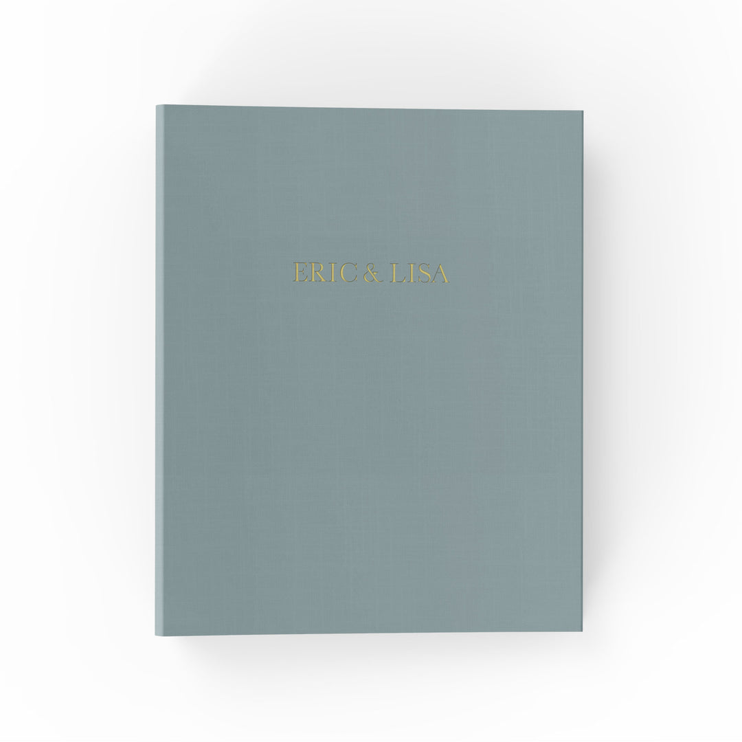 Our wedding binders are the perfect wedding planning tool, shown with the couple's first names on the cover