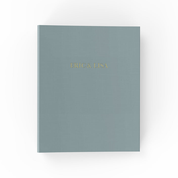 Our wedding binders are the perfect wedding planning tool, shown with the couple's first names on the cover